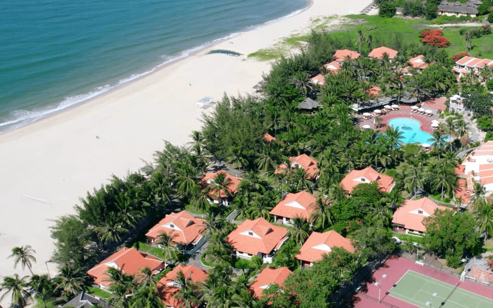 Phu Hai Beach featuring modern luxury resorts and pristine coastline representing the future of Vietnamese beach tourism
